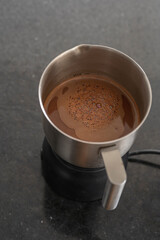 Delicious homemade chocolate in a chocolate maker