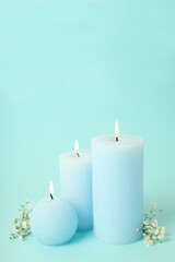 Fototapeta na wymiar Concept of relaxation with aroma candles, space for text