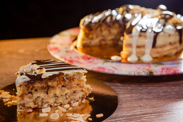a piece of cake with nuts and white dark chocolate