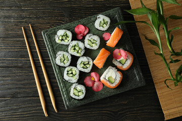 Concept of tasty food with sushi, top view