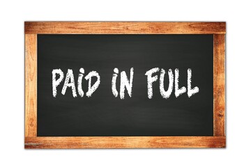 Obraz premium PAID IN FULL text written on wooden frame school blackboard.