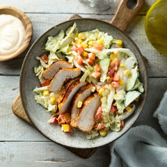 Grilled chicken with vegetable salad