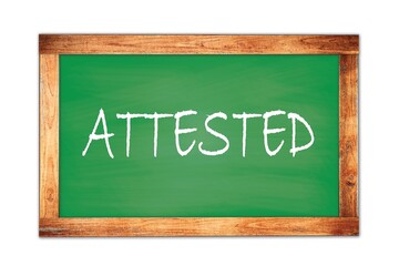 Fototapeta premium ATTESTED text written on green school board.