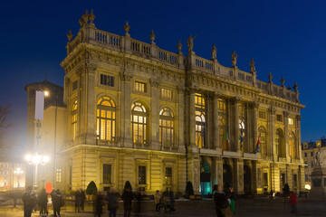 Fototapeta na wymiar Illuminated facade of Palazzo Madama in Turin at night, Italy.