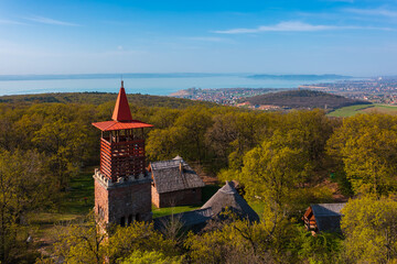 Alsóörs, Hungary - Aerial view about lookout tower on Csere mountain, with lake Balaton at the...
