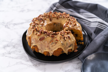 Chocolate pumpkin bundt cake with toffee glaze