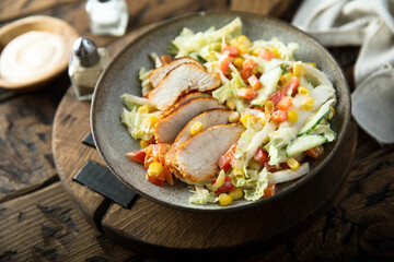 Grilled chicken with vegetable salad