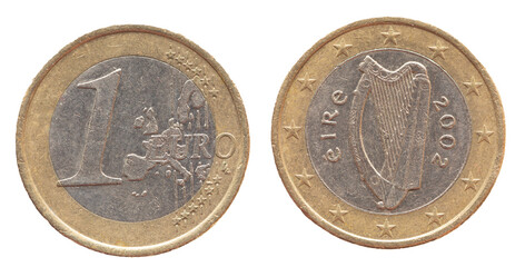 Ireland - circa 2002 : a 1 Euro coin of Ireland with a map of Europe and the Irish harp musical...