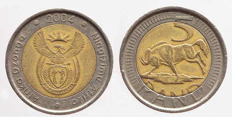 a 5 Rand coin of South Africa with the coat of arms and the motto 