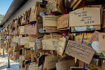 Small wooden plaques called Ema on which Japanese Shinto and Buddhist worshipers write prayers or wishes in Japan