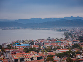 Fototapeta na wymiar Aerial view popular tourist city of Fethiye landscape and cityscape. View from top. Fethiye, Mediterranean sea, Turkey.