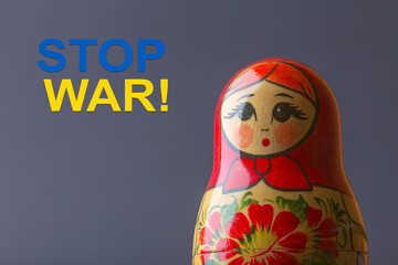 Matryoshka doll with Stop War text sign