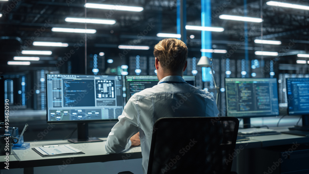 Poster Operator Sitting and Monitoring Various Activities Showing on Multiple Displays with Graphics. IT Technician Working on Artificial Intelligence, Big Data Mining, Neural Network Project.