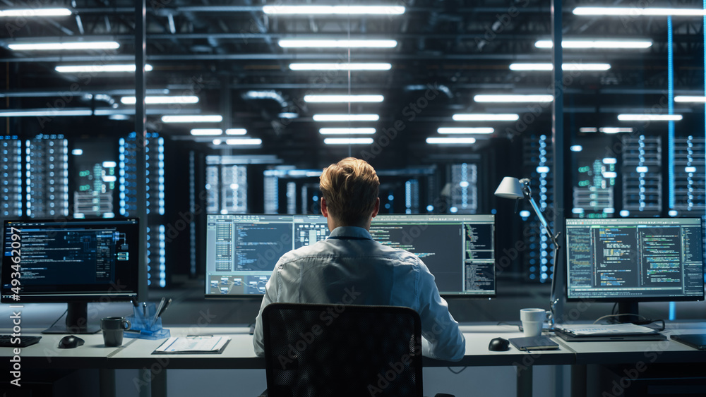 Poster In the System Control Room Technical Operator Sits and Monitors Various Activities Showing on Multiple Displays with Graphics. Responsibility for Information Security in the Company Concept