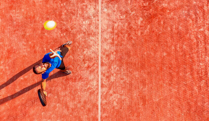 Top view of a professional paddle tennis player who is going to hit the ball.
