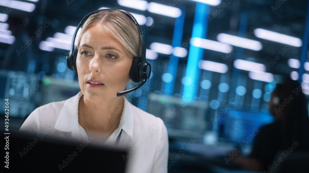 Poster beautiful caucasian female call center operator in headsets working in office and looking at the two