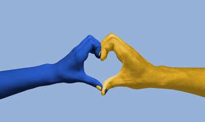 Painted in blue-yellow colors of Ukrainian flag hands gesturing isolated on bright background. Concept of help, support. Stand for Ukraine