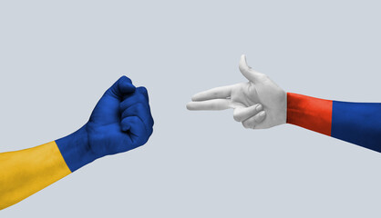 Stop war. Hand with Russia Flag colors attacking hand with flag of Ukraine on light background....