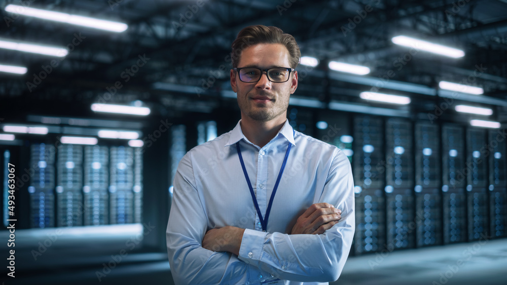 Aufkleber Male IT Engineer Working with Laptop in Data Center. Technician or Developer Standing at the Server Rack Corridor with a Laptop Computer. High-Speed Data Transfer, Analytics, Statistics Concept