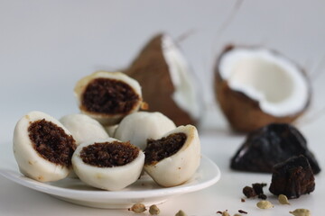 Steamed rice dumpling with a filling of palm jaggery and freshly grated coconut. Popular food of kerala commonly called Kozhikatta
