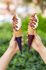girl holding ice cream cone