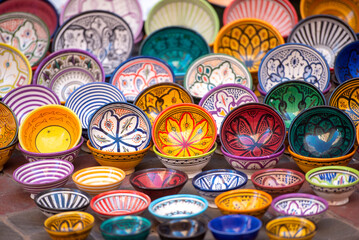 Traditional Moroccan souvenir plates at a street market, bazaar in Medina district in Morocco