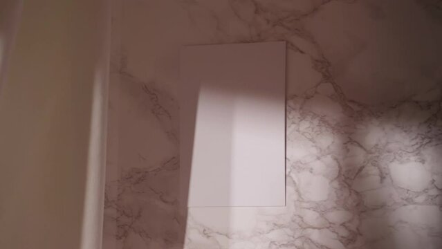 Blank A4 mock up for art work on neutral background with marble and curtain