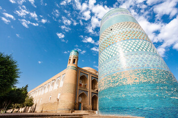Fototapeta premium Mohammed Amin Khan Madrassah and the Kalta Minor Minaret in Khiva, Uzbekistan, Central Asia