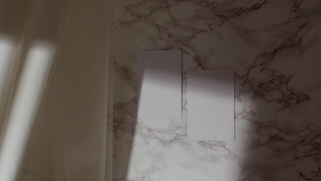 Blank A4 mock up for art work on neutral background with marble and curtain