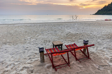 Colourful of the chair on the beach with sunset.