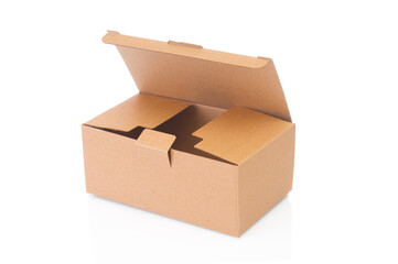 Open cardboard box close up on white background