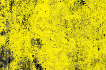 Distressed dark grunge textured yellow color old concrete wall surface for background