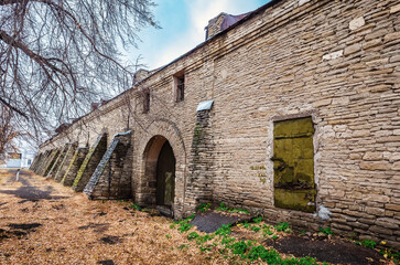 An old stone building, former meat warehouses of the merchant Khusainov. Russia, city of Orenburg