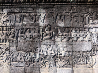 scene carved in cambodian temple