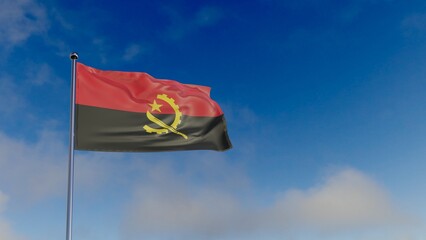 flag of Angola in the wind against the blue sky.