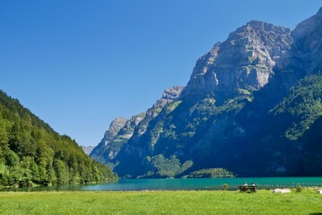 Idyllic mountain lake Kloentalersee in the Swiss Alps. Glarus, Switzerland.