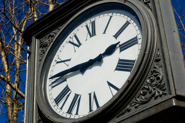 Old monumental clock at the railway station.