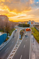 Fototapeta premium A road seen from above a sunset in San Sebastián, tourist city a spring morning. Gipuzkoa, Basque Country