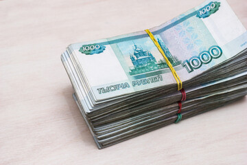 Bundles of bills. Russian banknotes. 1000 rubles bundles of bills.