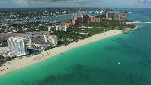 Flying over Paradise Island in Nassau, Bahamas. Caribbean vacation hotels and resorts.