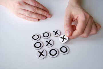 Tic-tac-toe close-up on a light background. The concept is so games for adults and children