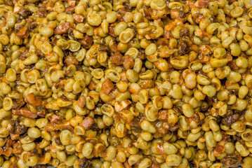 Top view of broad beans salad with some meat