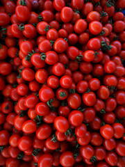 Ripe red tomatoes on a farmers market stall in the Aegean coastal town Yalikavak, Bodrum, Turkey.