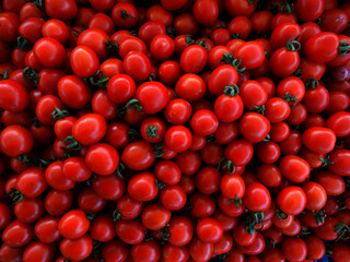 Ripe red tomatoes on a farmers market stall in the Aegean coastal town Yalikavak, Bodrum, Turkey.