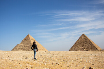 Woman looking at Pyramids, Giza, Cairo, Egypt