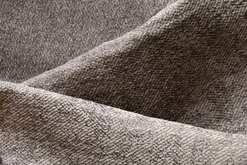 Fototapeta na wymiar Brown wrinkled velor fabric for background, fabric for background macro