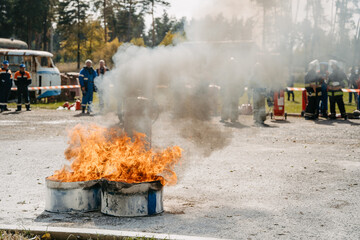 a firefighter puts out a fire at a training in Ukraine. High quality photo