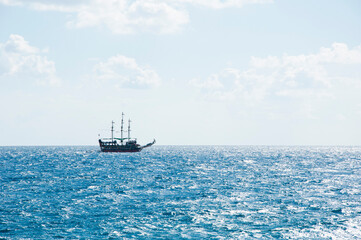 pirate ship in the sea water. summer vacation and traveling. copy space
