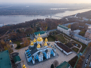 Aerial drone panoramic city view. St. Michael's Cathedral in Kyiv on a clear autumn morning. View from above. Space for text. The capital of Ukraine, before the war with Russia.