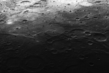 Lunar surface in craters. Elements of this image furnished by NASA